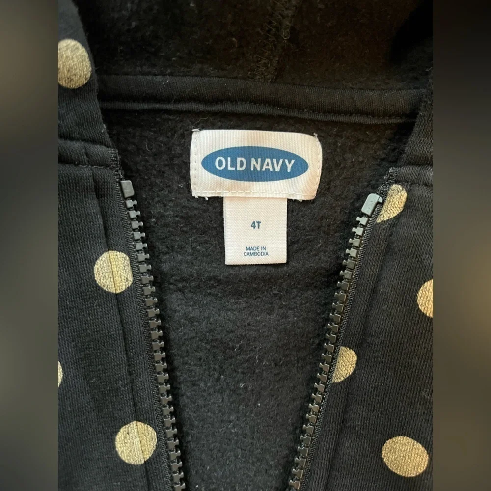 Girl’s Old Navy zip-up hoodie, black with gold polka dots, size 4t.